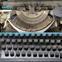 Details of an old retro typewriter, vintage style, dusty surfaces.
