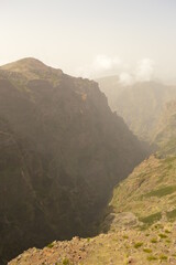 Hiking on the mountain ridge of Madeira Island on the way to Pico Ruivo, Portugal