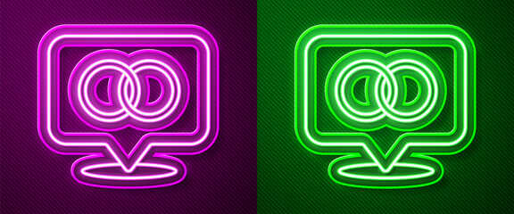 Glowing neon line Wedding rings icon isolated on purple and green background. Bride and groom jewelry sign. Marriage symbol. Diamond ring. Vector.