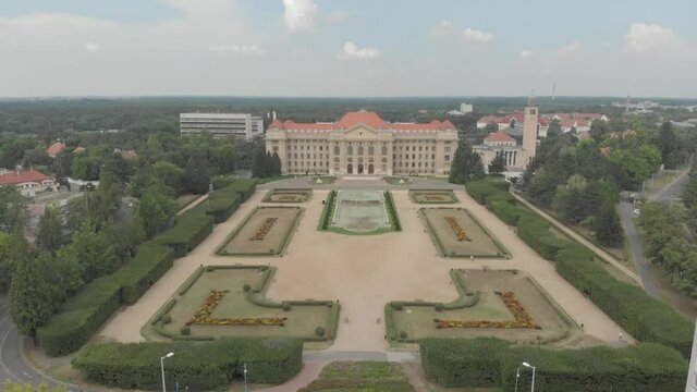 Aerial / drone footage of the University of Debrecen / Debreceni Egyetem in Debrecen, Hungary, located in the Northern Great Plain region