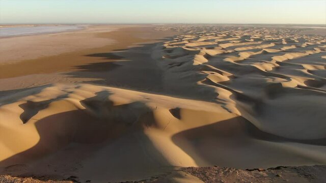 about flight of dunes in in the sahara, morocco with a drone 4k
