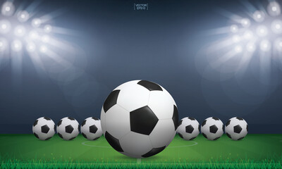 Soccer football ball and green grass of soccer field stadium background. Vector.