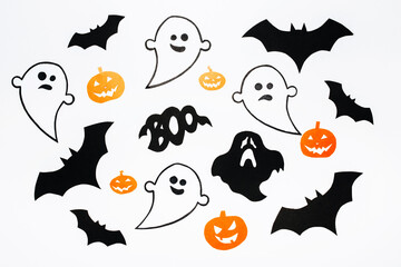 Happy halloween holiday concept. Bats, pumpkins and ghosts on white isolated background