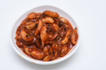 Home made sour hot and spicy garlic or Lehsun pickle,  Kerala South India made using red chilli and Indian spices. Its cloves are used for consumption raw or cooked or for medicinal purposes