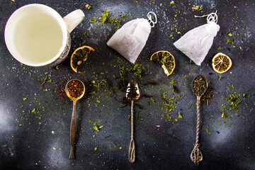 Set of tea on the vintage silver spoons, various of tea and cup of tea