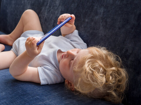 One Year Old Baby Watching Youtube Video On A Mobile Phone