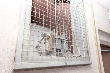 Fire ventilation in a corridor of a residential building, automatic mechanism opening a hatch door of a ventilation shaft in a case of a fire