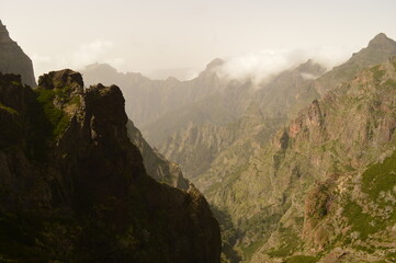 Fototapeta premium The dramatic, misty and beautiful mountain landscape of Madeira Island in Portugal