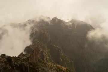 Fototapeta premium The dramatic, misty and beautiful mountain landscape of Madeira Island in Portugal