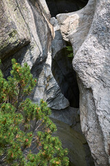 Fototapeta premium Cavaglia, Switzerland - July 22, 2020 : View of Giants pots in Cavaglia Glacier garden