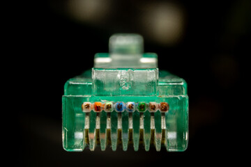 Macro cross section front angle view of RJ45 CAT6 shielded network data internet cable clear connector