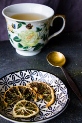Obraz na płótnie Canvas Set of tea, vintage silver spoons, various of tea and cup of tea