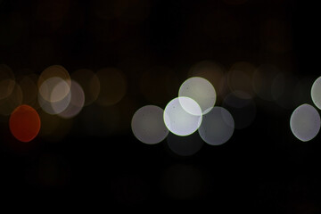 Colorful bright night city lights blurred bokeh background.