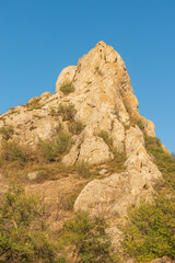 Landscape of the Crimean mountains, local attraction mount Bal Kaya in the village of Kurortnoye, the mountain serves as a landmark and a lighthouse in the daytime