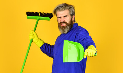 he loves his job. Janitor in gloves. husband cleaning house. Housework and domestic duty. Male janitor with cleaning supply. sweeping the floor. man cleaner. bearded man cleaning with mop