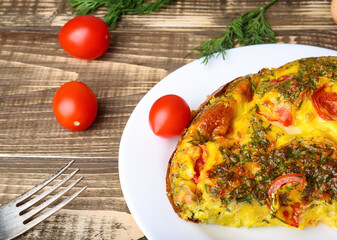 Omelet with vegetables close-up