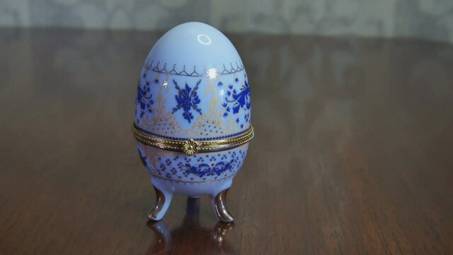 Decorative Ceramic Imperial Faberge Egg Replica. Video Dolly Arc Left Footage