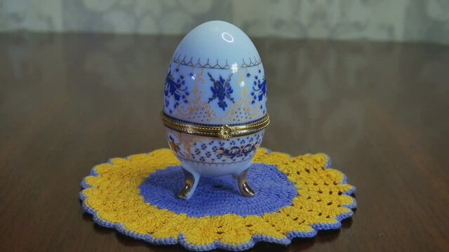 Decorative Ceramic Replica Faberge Egg. Video Dolly Arc Left Footage