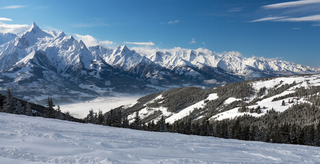 Winter view from the top of Ausrtian Alps in Kaprun ski resort, National Park Hohe Tauern, Europe, Austria
