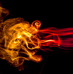 Colored smoke on black background
