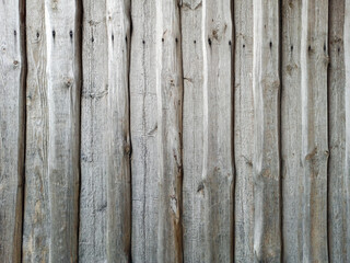 Background from boards of wooden fence. Grunge texture