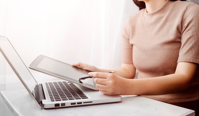 Naklejka premium Searching Browsing Internet Data Information with blank search bar.businessman working with smart phone, tablet and laptop computer on desk in office. Networking Concept