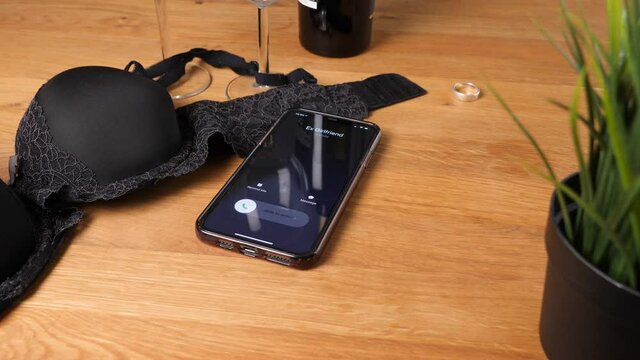 Jealous Ex-Girlfriend Calling Cell Phone while Engaged in Sexual Activities - Concept