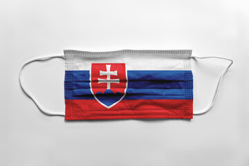 Face mask with Slovakia flag printed, on white background, isolated