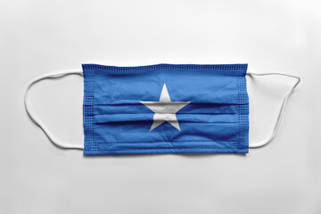 Face mask with Somalia flag printed, on white background, isolated