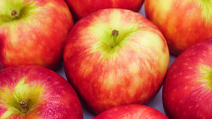 Fototapeta na wymiar Fresh red apples with drops of water, closeup. 