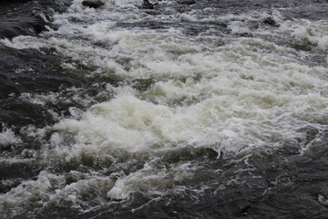 water flowing into the river