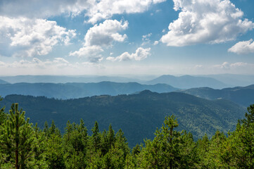 Beautiful summer landscape in mountains with cloudy sky. Zlatibor Serbia