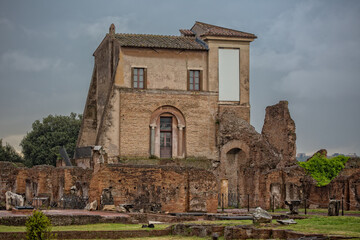 Fototapeta na wymiar Ancient Roman ruins on the Palatine hill in Rome. Great view of the House of Livia at the Palatine Hill in Rome, Italy