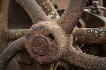 rusty wheel hub of a historic machine