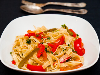 Tagliatelle with peppers and parsley