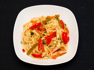 Tagliatelle with peppers and parsley