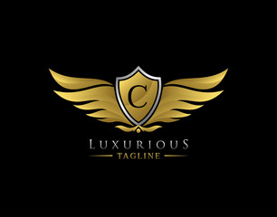 Luxury Wings Logo With C Letter. Elegant Gold Shield badge design for Royalty, Letter Stamp, Boutique,  Hotel, Heraldic, Jewelry, Automotive.