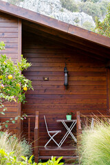 wooden bungalow cabin and citrus trees
