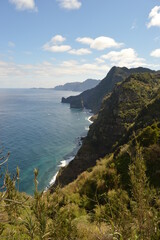 Fototapeta premium Hiking along the coast, in the mountains and along the levadas of Madeira Island in Portugal