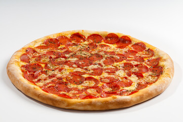 Pepperoni pizza on white background. Copy space. Selective focus