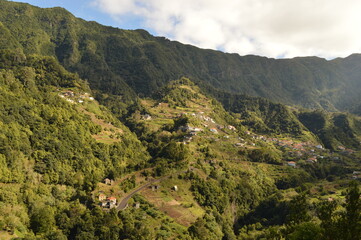 Obraz premium Hiking along the coast, in the mountains and along the levadas of Madeira Island in Portugal