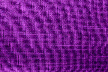 Texture of purple fabric with a pattern. Pattern on a purple background for design