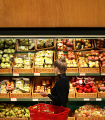 Woman buying fruits at the market	