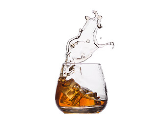 A glass of whiskey with splashes from the ice cube isolated on white. alcohol splashes. whisky or...