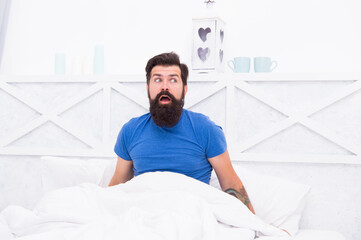 amazed bearded man hipster surprised about morning erection, mens health concept