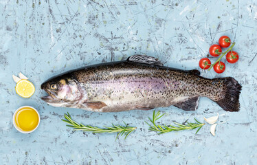 fresh trout with spices and seasonings top view, flat lay