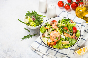 Seafood salad with leaves and vegetables.
