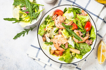 Seafood salad with leaves and vegetables.