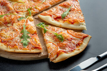 Traditional Italian pizza margarita with cheese and tomatoes