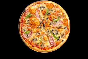 Pizza with ham and mushrooms on a thin crust. Black background.